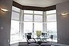 After:  Dining room shot on Central Park West - solar shades, contoured flat valance with kick pleats, ripplefold draperies and 